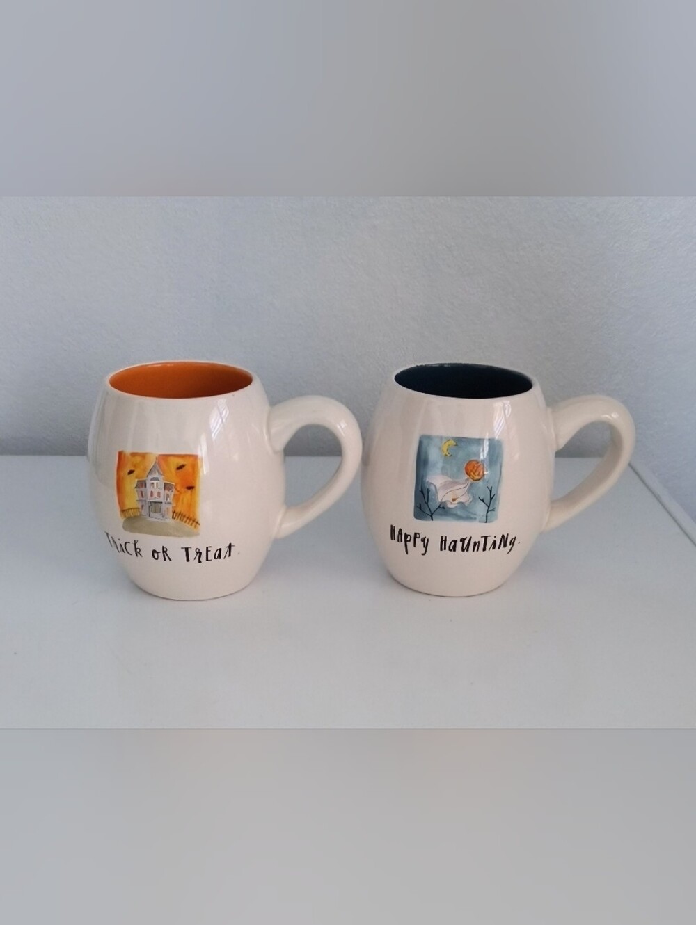 Rae Dunn Ceramic Halloween Mugs - White with Orange & Navy Interiors